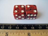 Dice : d6.O..pippedredspeckled